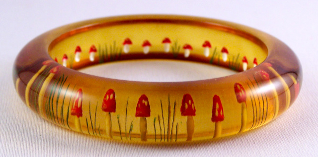 AB22 mushroom reverse carved bakelite bangle